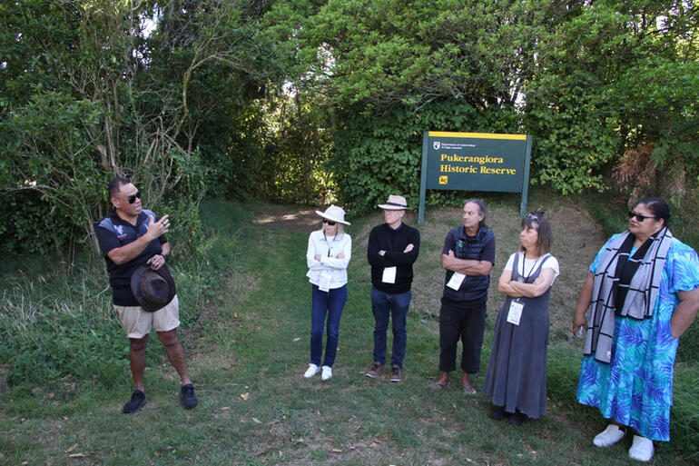 Damon Ritai opens the pilgrimage to Pukerangiora. L-R: Lynn & Abp Geoff Smith (Aus), Abp Justin & Jenny Duckworth, Mrs Taina Ulu'ilakepa.